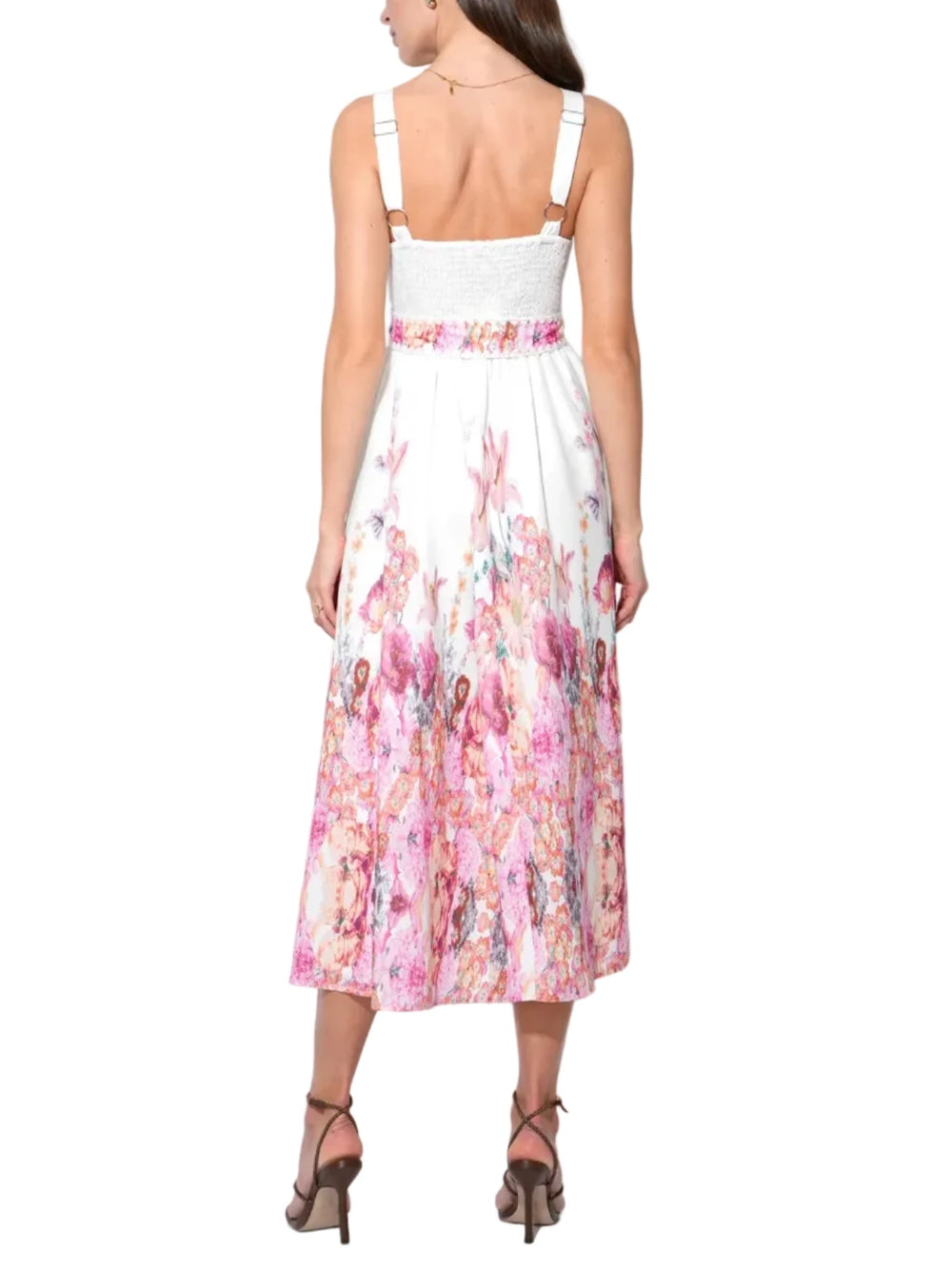 The blooms are strategically positioned—often "growing" upward from the hem and cascading down from the shoulders—to draw the eye vertically and create an elongating, slimming effect. The V-neckline provides a classic, flattering frame for the décolletage, while the midi-length skirt offers a graceful, sophisticated sweep.