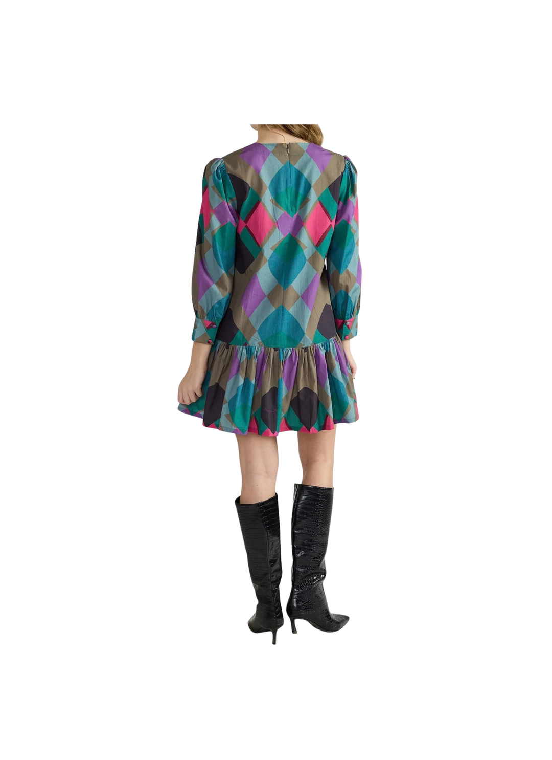 A playful split neckline and softly gathered shoulders set a breezy tone up top, while long cuffed sleeves and a relaxed body swing into a flirty drop-waist flounce at the hem. Slip on knee-high boots and let that twirl-worthy skirt do the talking.