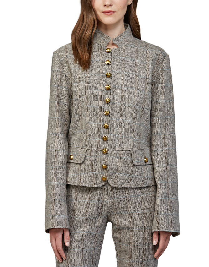 Step out in style with the Abbie Herringbone Pattern Jacket in Cream/Brown. This tailored jacket features a chic stand collar and a timeless herringbone design that adds a dash of sophistication to any outfit.