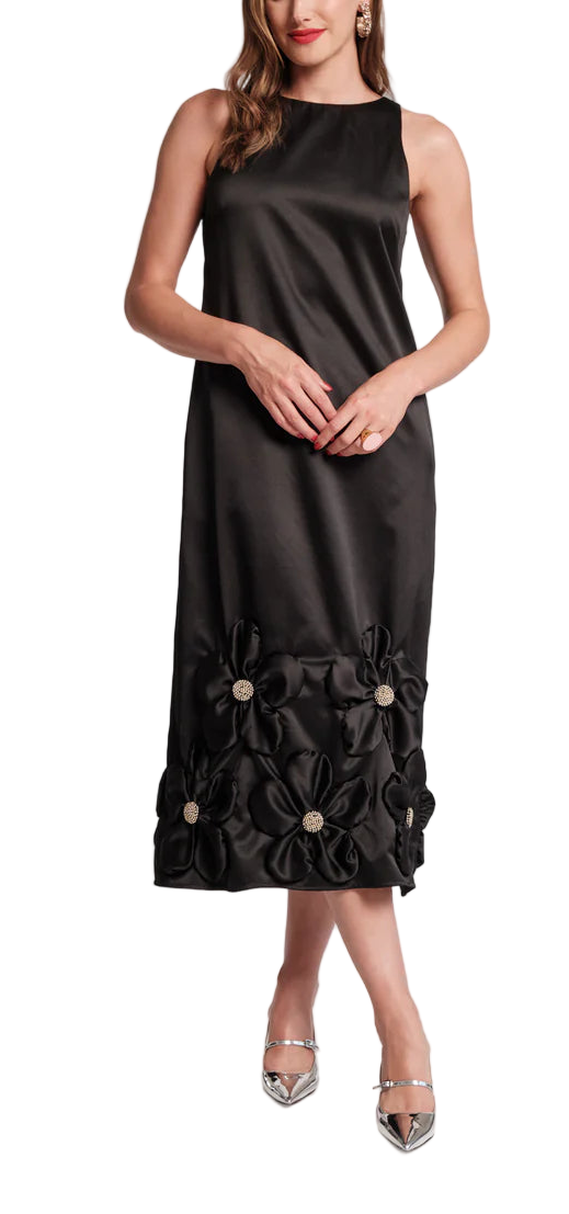 Simple at first glance, until you notice the shimmering flowers. The Francesca is a study in understatement with a twist, crafted in silky black fabric and dotted with 3D floral appliques across the hemline. Cut with a clean, sleeveless silhouette and a full-length skirt that skims the body, it’s fully lined and finished with a hidden back zipper for a smooth fit. 