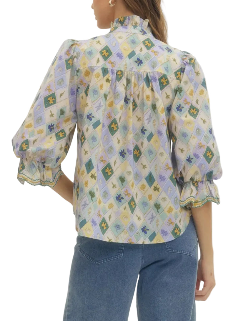 Diamond pattern print 3/4 puff sleeve top featuring ruffled neck and button closure at front. Elasticated cuffs with scallop accent trim. Unlined. Woven. Non-sheer. Lightweight.