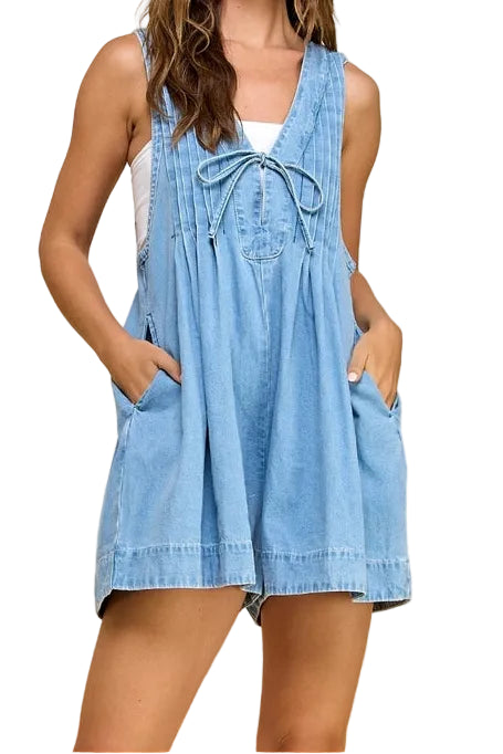 • Washed denim
• Deep v-neck with string tie
• Pleated detail back
• Sleeveless
• Side pocket
• Mini length
• Imported

Handwash Cold
100% Cotton

Model is 5&