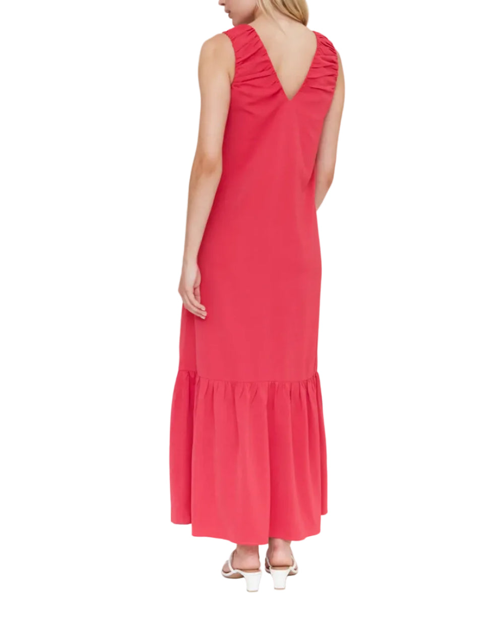 Woman wearing a fuchsia dress with a white background