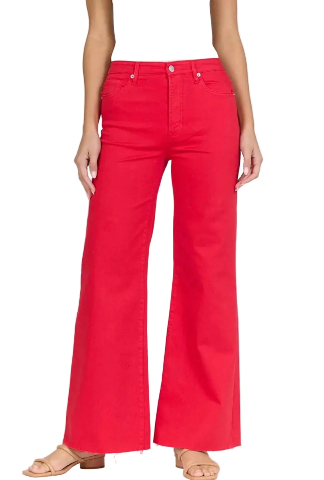 Red flared jeans worn by a person on a white background