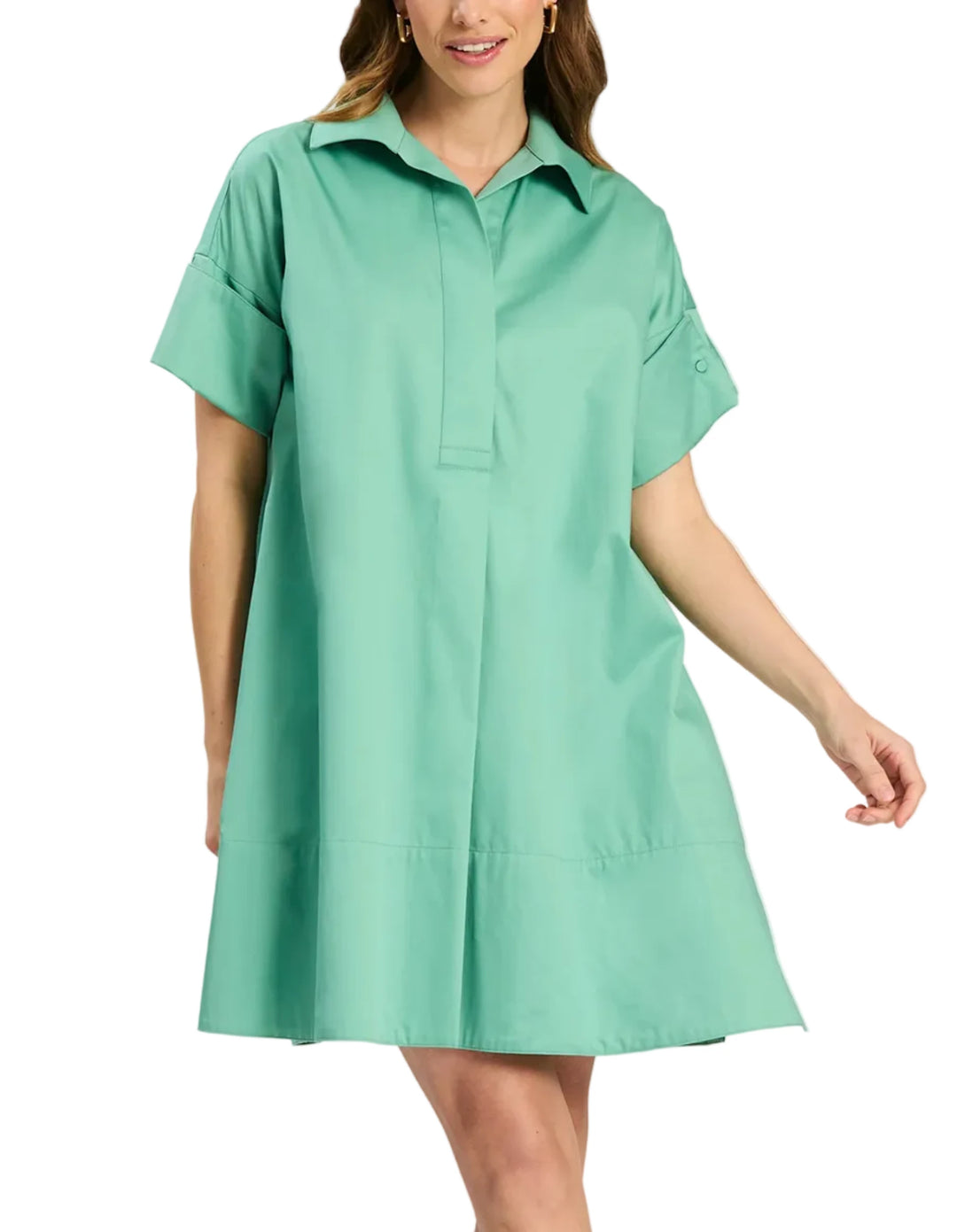 Woman wearing a green dress on a white background