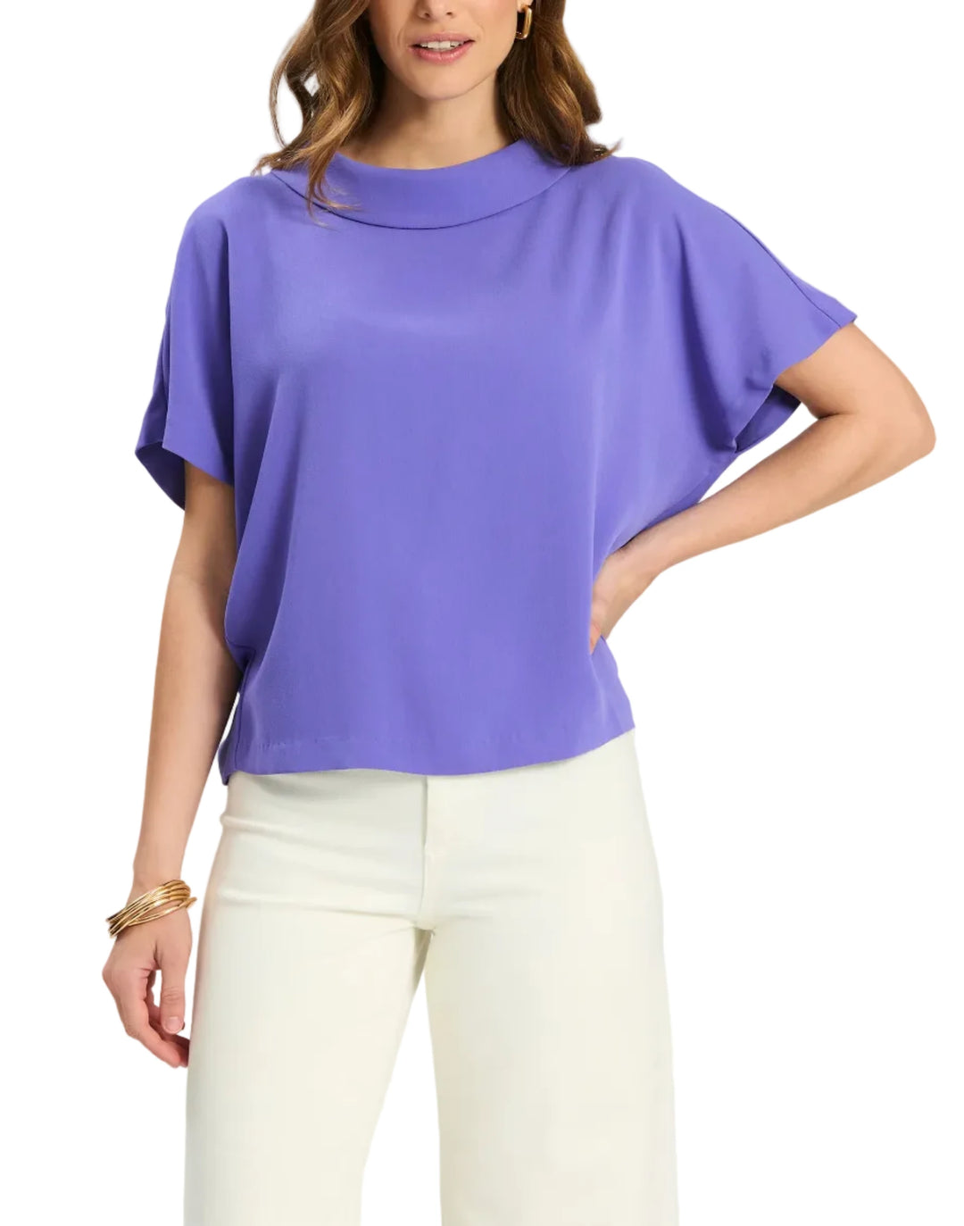 
The Mary Topper is one of those pieces that instantly makes an outfit feel more put together. With the signature mock neck, this top is not only flattering with the way it drapes but multifunctional in your wardrobe. Style it with a pant for a daytime look and then swap to a heel for dinner. The kind of piece that makes getting dressed feel fun again.

Wide funnel/mock neckline with soft rolled collar
Cap sleeves with relaxed arm opening
Shell: 100% Polyester
Machine wash cold, do not dry clean