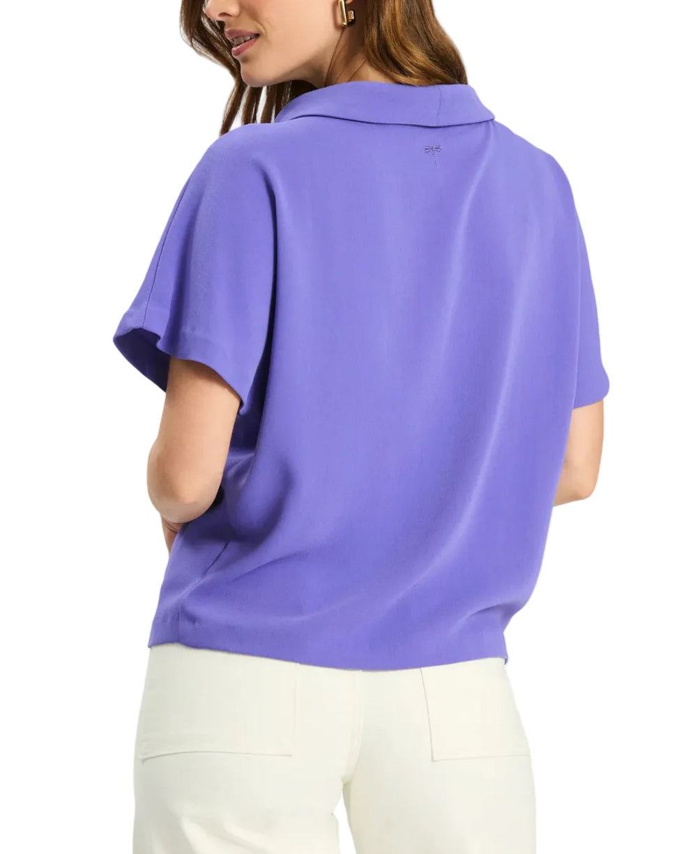 
The Mary Topper is one of those pieces that instantly makes an outfit feel more put together. With the signature mock neck, this top is not only flattering with the way it drapes but multifunctional in your wardrobe. Style it with a pant for a daytime look and then swap to a heel for dinner. The kind of piece that makes getting dressed feel fun again.

Wide funnel/mock neckline with soft rolled collar
Cap sleeves with relaxed arm opening
Shell: 100% Polyester
Machine wash cold, do not dry clean