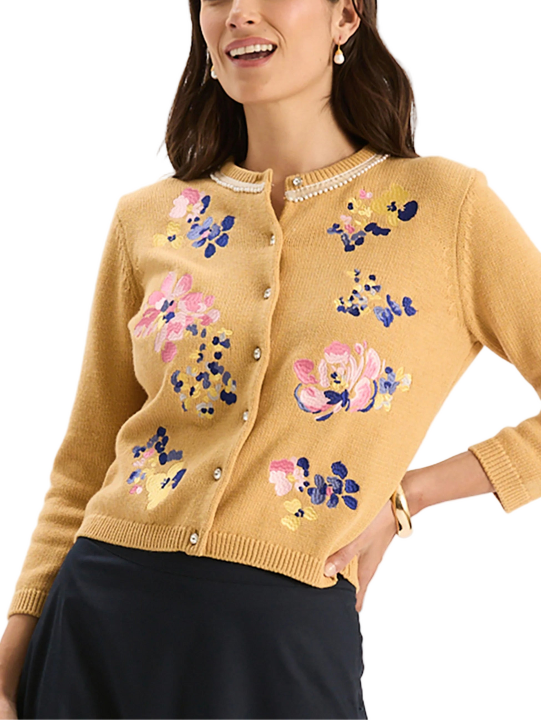 The Flora Embroidered Cardigan is a timeless favorite featuring delicate floral embroidery that adds a romantic, feminine touch to any outfit. Drape it over your shoulders, pair it with a skirt, or wear it casually with denim – its styling opportunities are endless. Made from a cotton blend, this cardigan is the perfect midweight knit for year-round.

Jewel button front
Crew neck
Pearl trim along collar
Three-quarter length sleeves
Embroidered floral design
Ribbed neckline, cuffs and hem
