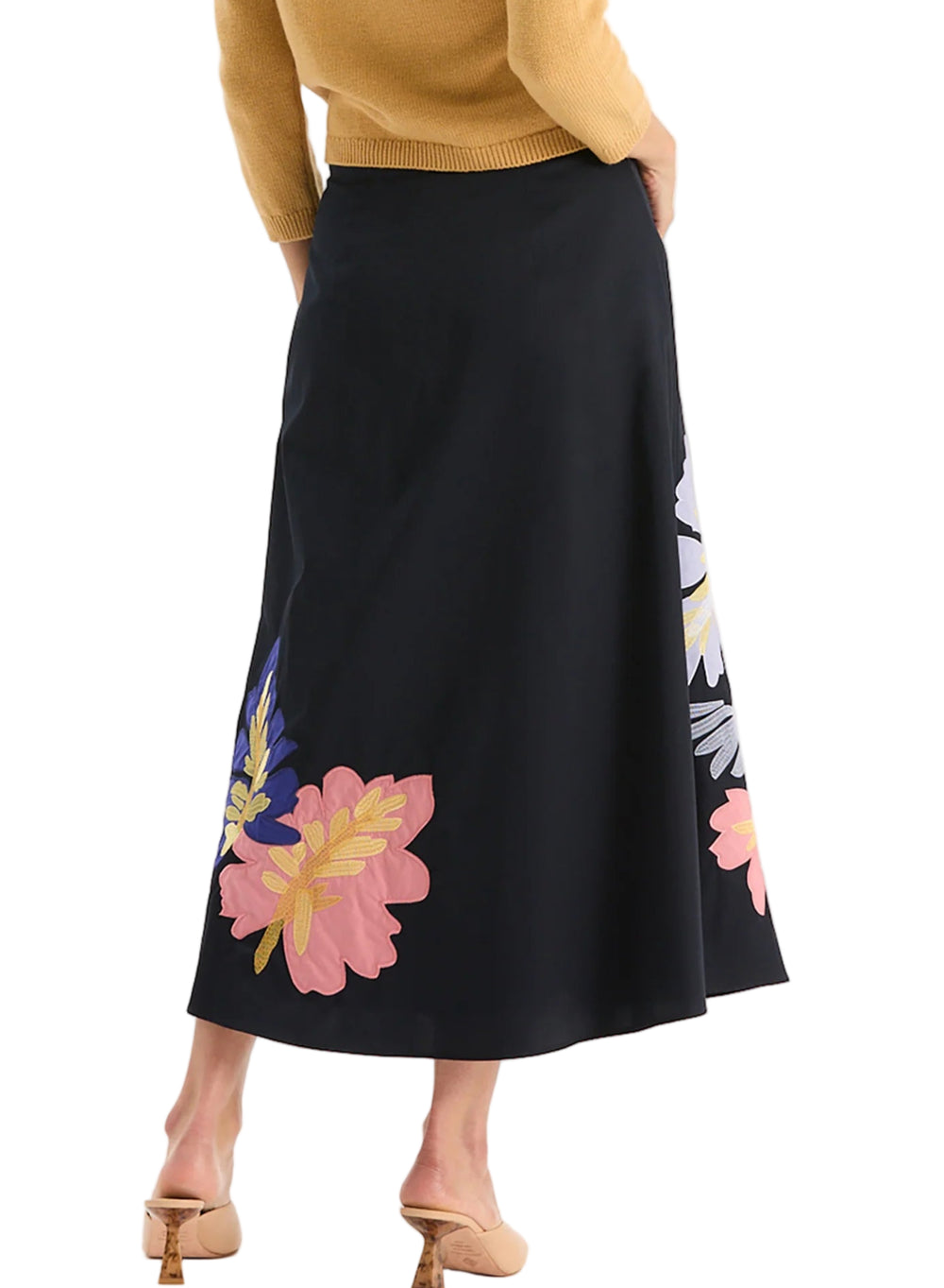 The Valentina Appliqué Skirt stands out with bold floral embroidery. The silhouette features a comfortable waistband, an A-line shape, and a flowing midi length for a graceful finish. Striking yet versatile, this piece moves effortlessly from day to evening and pairs beautifully with everything from knits to blouses.

Side zip closure
A-line silhouette
100% Cotton
Machine wash cold, lay flat to dry