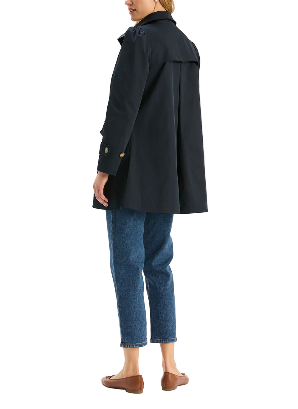 Crafted from a durable, weather-ready fabric, the Sutton Water Repellent Trench is designed to keep you dry without sacrificing style. The silhouette features a high stand collar, button-front closure, and tailored seams for a flattering, structured fit. With roomy flap pockets, this coat is both practical and polished.

Front button closure with tortoise shell-style buttons
Stand collar
Two front flap pockets with button closures
Adjustable button-tab cuffs
Slightly gathered puff shoulders
