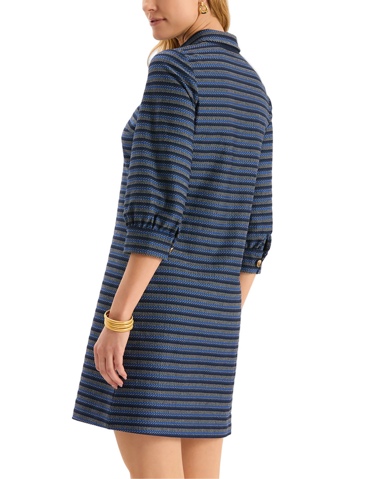 The Rory Cotton Shirtdress features a classic shirt collar, gold button accents, and flap pockets for a touch of function and flair. Easy to style and effortless to wear, this piece transitions seamlessly from weekday errands to weekend outings.

Classic shirt collar
Gold button accents
Roll tab sleeves
Front flap pockets
100% Cotton
Machine wash cold, lay flat to dry