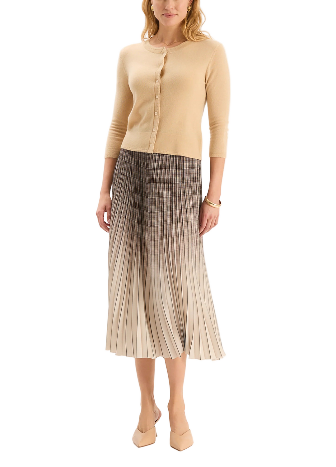Designed in a classic plaid pattern, the Cara Pleated Skirt showcases gradient tones to create an ombré effect The design features pleats throughout, a chic midi length, and a flattering A-line silhouette that creates elegant movement with every step.

Elasticized waistband
Allover pleats
100% Polyester
Dry clean only