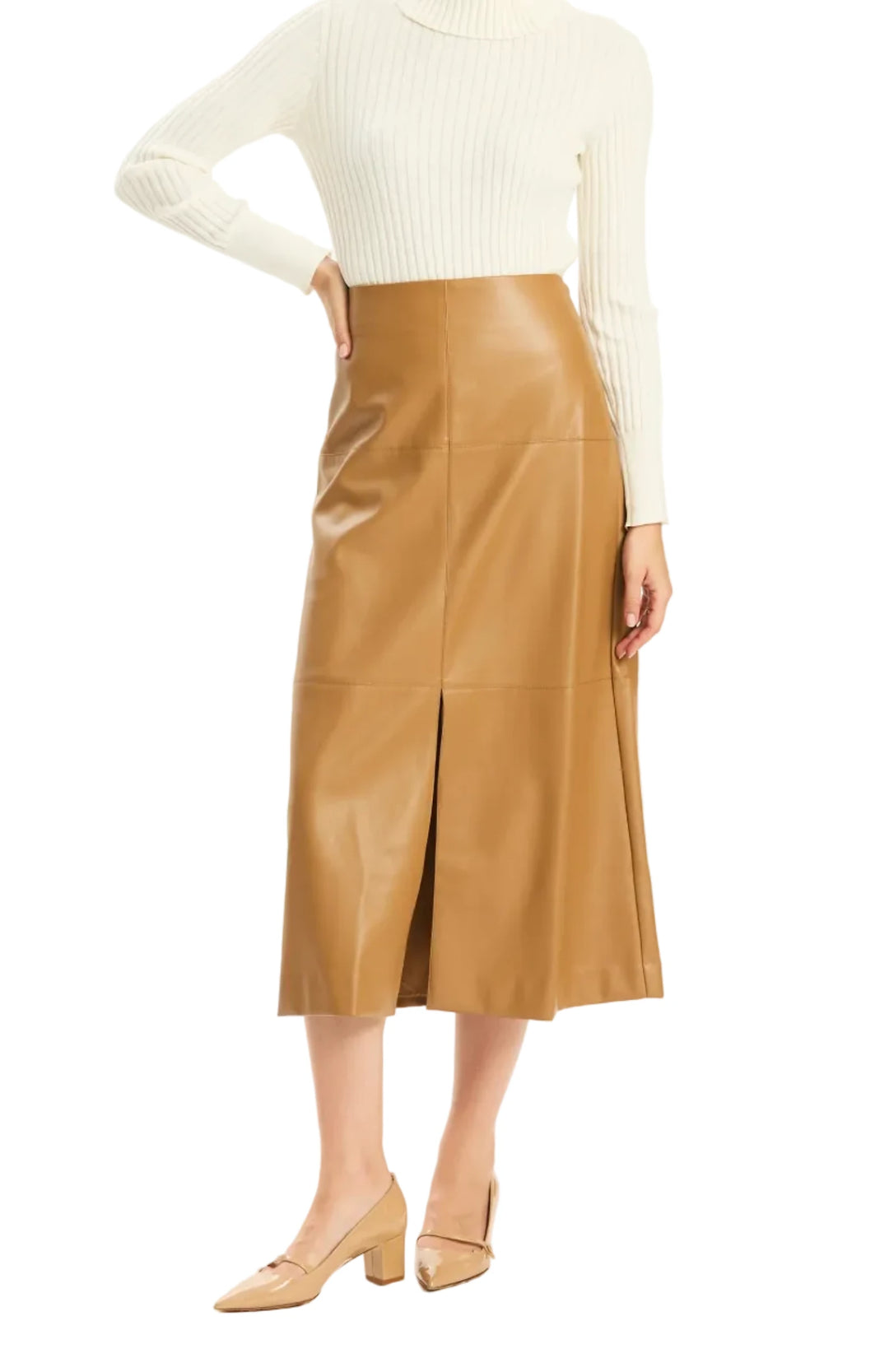 A woman modeling a cream ribbed mock-neck long-sleeve top and a tan faux-leather midi skirt with a front slit, paired with tan heels, against a plain white studio background.