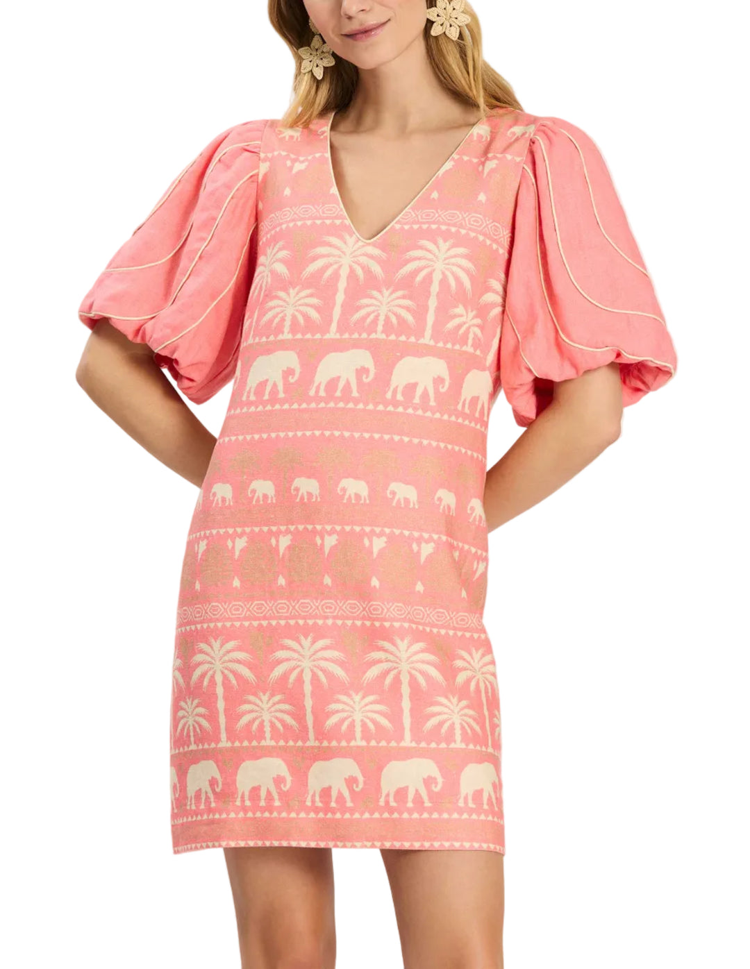 This puff-sleeve linen dress brings a fresh, playful energy to warm weather dressing. Designed with a vibrant tropical motifs, it balances eye-catching detail with a flattering, easy-to-wear silhouette. The structured bodice adds polish, while the airy puff sleeves give it a feminine, modern feel. Effortless yet statement-making, this dress is perfect for warm-weather days when you want something special that still feels comfortable and relaxed.

V-neckline
Balloon sleeves with cord piping details
Back zipp