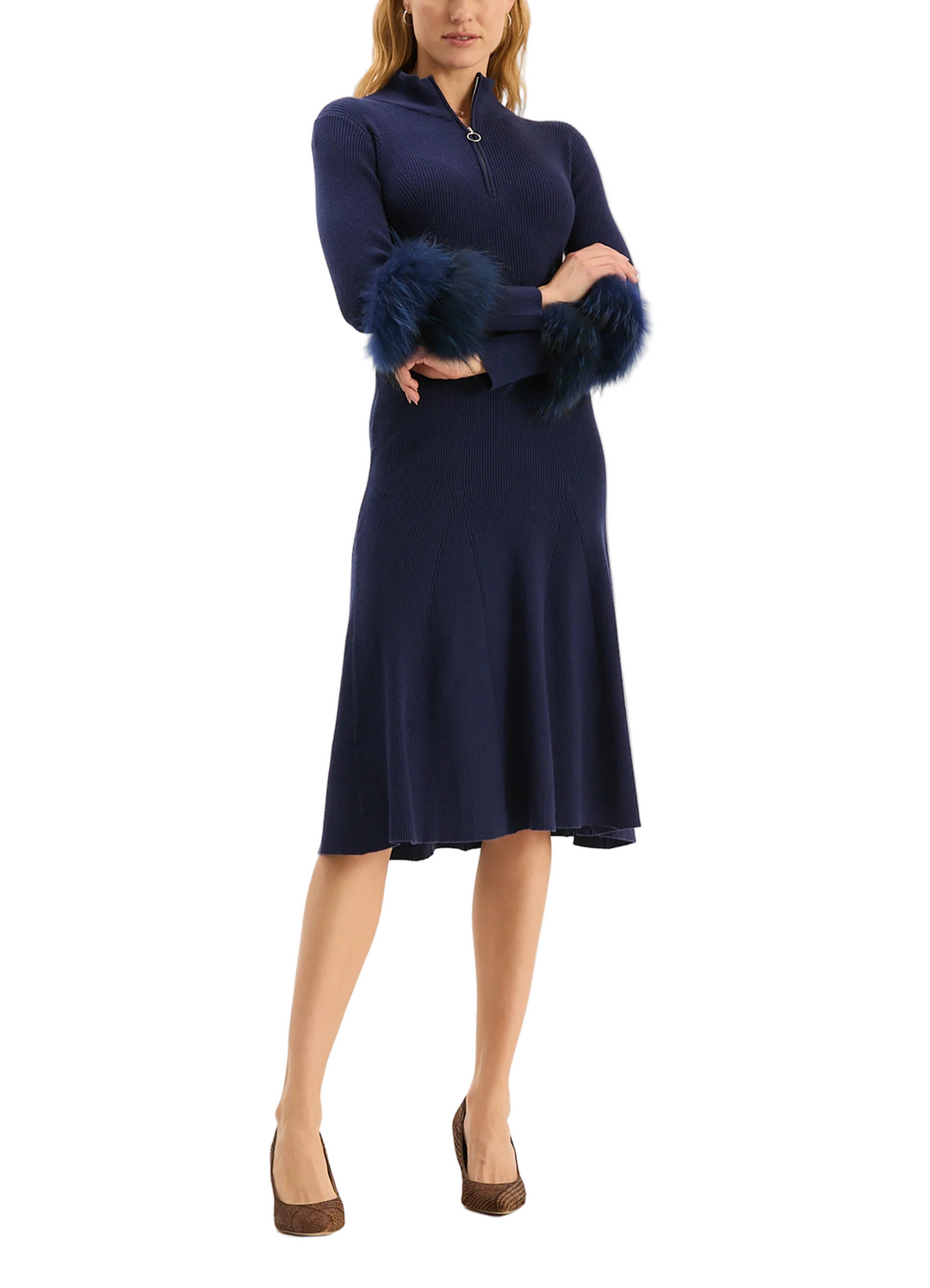 A must-have for your special occasions this season, the Celia Knit Fur Sleeve Dress is a fun and glamorous style with a mock neck and fur cuffs. The elegant silhouette features a fitted bodice, long sleeves, and a midi length that creates a sophisticated and party-ready look.

Elbow-length sleeves
Fur sleeve detail
Mock neckline
62% Viscose, 38% Polyester, Fur: Raccoon
Hand wash cold or dry clean
