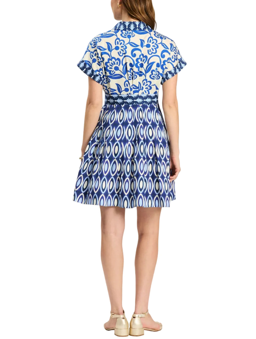 A playful yet polished warm-weather dress designed to stand out, the Hailey dress features a bold mixed blue print with a classic collar and easy button-front styling. Finished with a flattering tie-waist and functional pockets, this dress offers comfort without sacrificing style. Perfect for warm-weather events, weekends, and vacation days, it pairs beautifully with sandals or wedges for an elevated seasonal look.

Point collar
Button front
Cuffed cap sleeve
Pleated skirt
Self-tie belt
Side seam pockets
10