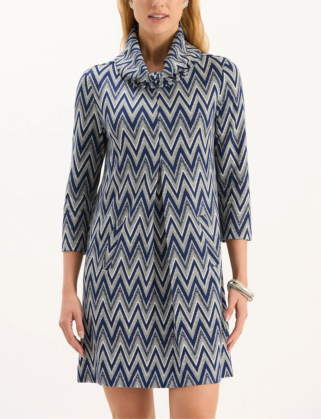 Our #1 best-selling dress, Kim is a must-have for fall. Classy and cozy with a chic cowl neck, made in our signature, wrinkle-free knit fabric. Whether you dress her up or down, Kim is an easy throw-on-and-go. Featured here in a classic chevron pattern, perfect for the fall and winter seasons.

Cowl neck
Inverted front pleat
Side pockets
Pullover style
70% Polyester, 25% Rayon, 5% Spandex
Machine wash cold, lay flat to dry or dry clean