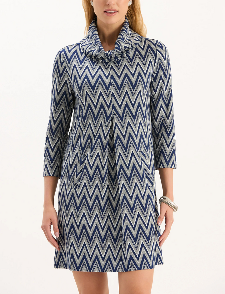 Our #1 best-selling dress, Kim is a must-have for fall. Classy and cozy with a chic cowl neck, made in our signature, wrinkle-free knit fabric. Whether you dress her up or down, Kim is an easy throw-on-and-go. Featured here in a classic chevron pattern, perfect for the fall and winter seasons.

Cowl neck
Inverted front pleat
Side pockets
Pullover style
70% Polyester, 25% Rayon, 5% Spandex
Machine wash cold, lay flat to dry or dry clean