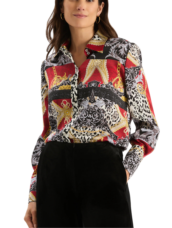 The Chloe Silk Shirt brings instant artistic flair and modern sophistication with its abstract print, classic collar, and relaxed silhouette. Dress it up or keep it casual in this eye-catching statement piece.

Button-down front
Point collar
Long sleeves with buttoned cuffs
100% Silk
Dry clean only