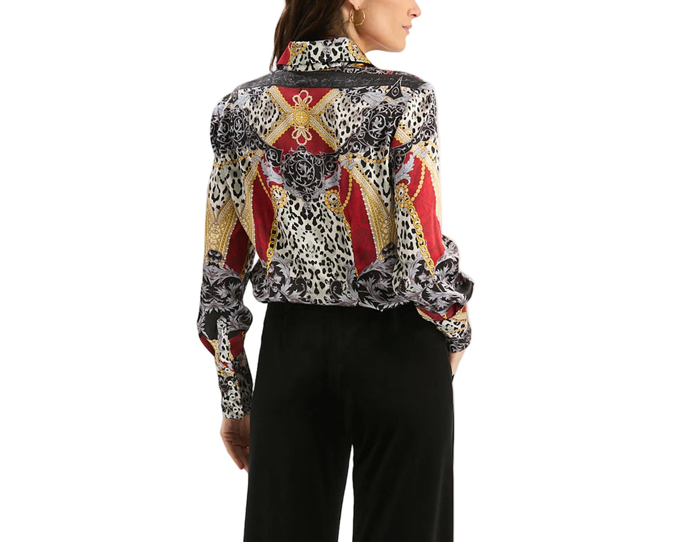 The Chloe Silk Shirt brings instant artistic flair and modern sophistication with its abstract print, classic collar, and relaxed silhouette. Dress it up or keep it casual in this eye-catching statement piece.

Button-down front
Point collar
Long sleeves with buttoned cuffs
100% Silk
Dry clean only