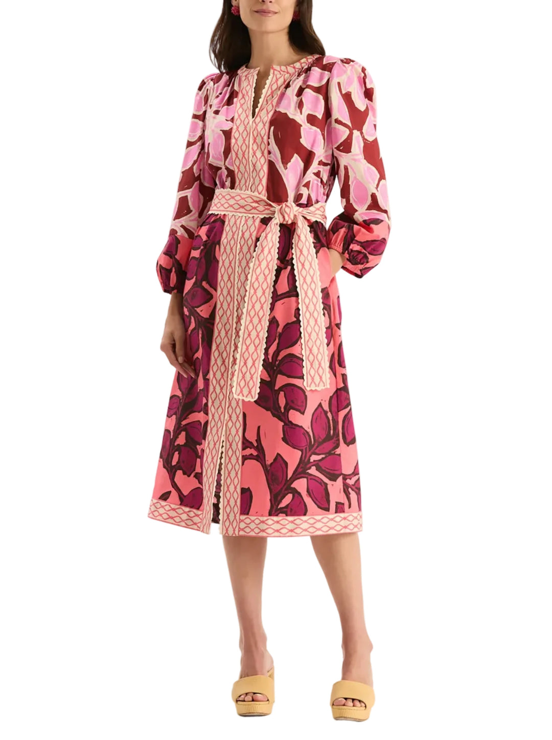 The Kelsey Cotton Print Dress has a midi-length silhouette, a flattering V-neckline and slightly puffed shoulders. Elevated with a bold floral print and beautiful pink borders in rich pink tones along with tie-able sash, this piece is easy to wear for special occasions and styled effortlessly as a standout wardrobe piece.

Notch neckline with front placket
Bracelet length sleeves
Side seam pockets
Unlined
Waist tie
100% Cotton
Machine wash cold, lay flat to dry