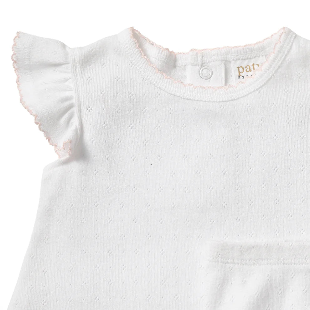 A timeless two-piece set designed with delicate detail and everyday comfort in mind. Crafted from soft organic cotton pointelle, this baby girl outfit features a flutter sleeve top with subtle picot trim and coordinating bloomers for a polished, classic look. &amp;nbsp;Lightweight, breathable, and gentle on baby’s skin, it’s perfect for warm days, special outings, or layering through the seasons. Thoughtfully designed for ease and comfort, this set is a beautiful choice for baby showers, gifting, and everyday w