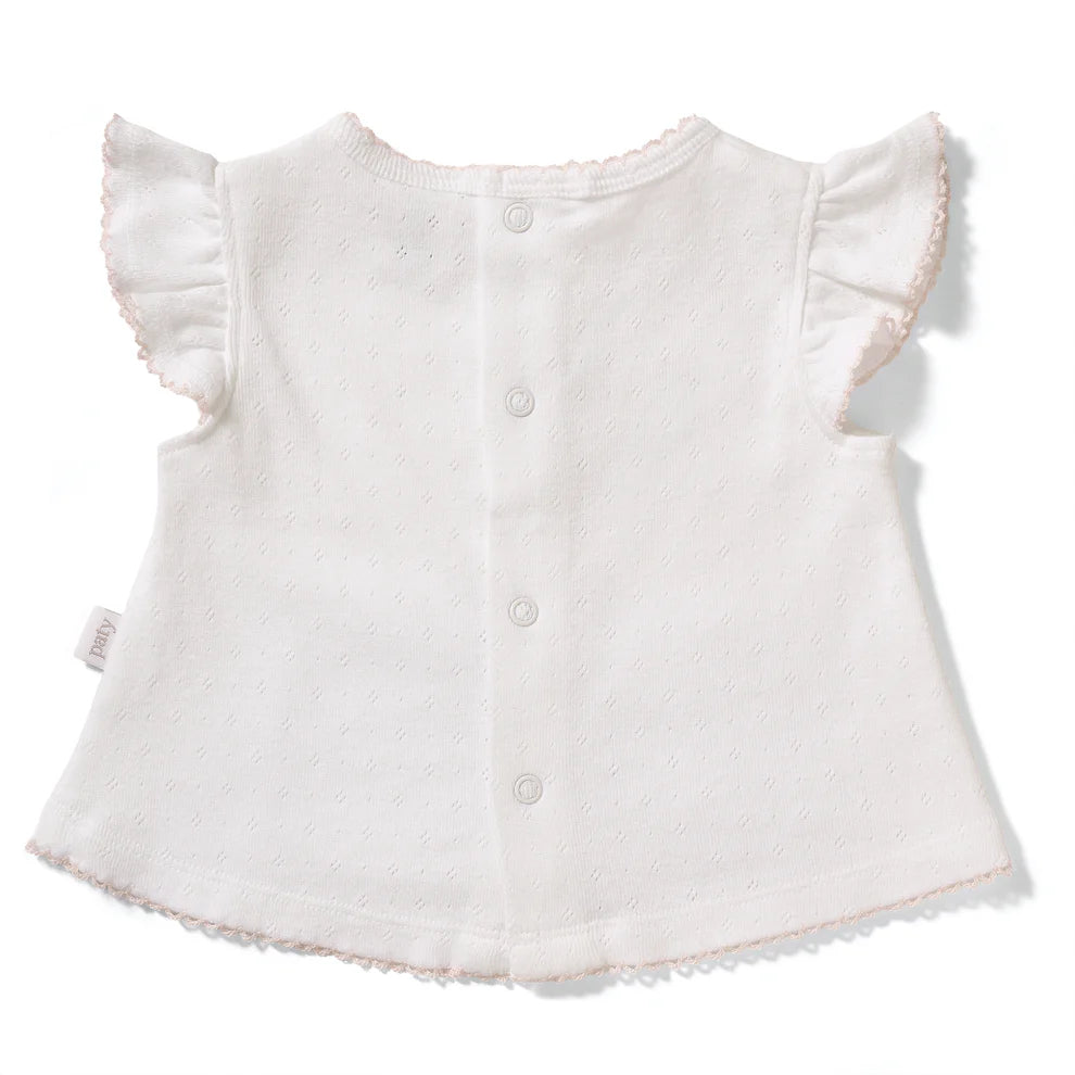 A timeless two-piece set designed with delicate detail and everyday comfort in mind. Crafted from soft organic cotton pointelle, this baby girl outfit features a flutter sleeve top with subtle picot trim and coordinating bloomers for a polished, classic look. &amp;nbsp;Lightweight, breathable, and gentle on baby’s skin, it’s perfect for warm days, special outings, or layering through the seasons. Thoughtfully designed for ease and comfort, this set is a beautiful choice for baby showers, gifting, and everyday