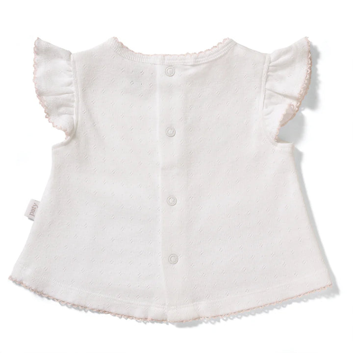 A timeless two-piece set designed with delicate detail and everyday comfort in mind. Crafted from soft organic cotton pointelle, this baby girl outfit features a flutter sleeve top with subtle picot trim and coordinating bloomers for a polished, classic look. &amp;nbsp;Lightweight, breathable, and gentle on baby’s skin, it’s perfect for warm days, special outings, or layering through the seasons. Thoughtfully designed for ease and comfort, this set is a beautiful choice for baby showers, gifting, and everyday