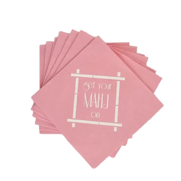 Stack of pink napkins with white text on a light gray background