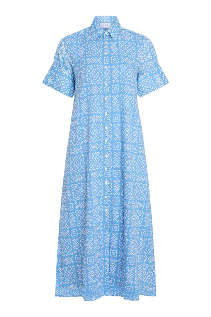 Our Gibbons Dress is a more tailored version of our classic shirt dress and is the perfect style for when you want to look effortlessly put-together. The folded sleeve, collar neckline and hidden pockets make this dress breezy and comfortable, but also formal and classic. Pair with loafers for a meeting with clients or chunky heels for dinner with the girls.

Short sleeve
Button front
Shirt collar
Pockets
100% cotton voile 
LIVRO is designed in Charleston and manufactured at the highest quality facility in 
