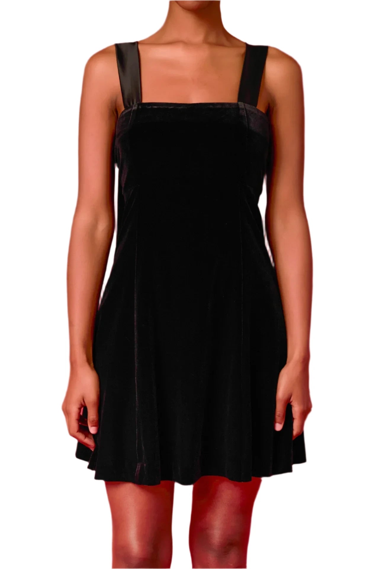 This chic dress features a luxe velvet material combined with a satin bow tie shoulder detail for an elegant look. It has a mini-length and a fit-and-flare silhouette for a flattering shape. Velvet