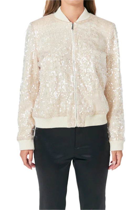 The vibrant sequins give it a unique and eye-catching shimmer that will instantly elevate any look while the bomber style ensures maximum comfort and warmth. Our jacket is perfect for update your wardrobe and keeping you cozy all season.