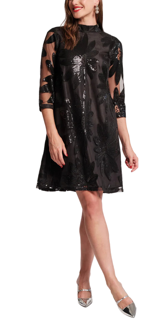 The Diplomat Mini is back for the holiday season, bringing with it all the bows, pleats, and feminine charm you love. This time, it arrives with a festive update: sheer mesh sleeves adorned with delicate floral sequin embroidery, scattered like midnight stars. Equal parts timeless and luminous, it’s a party-ready piece destined to shine year after year.