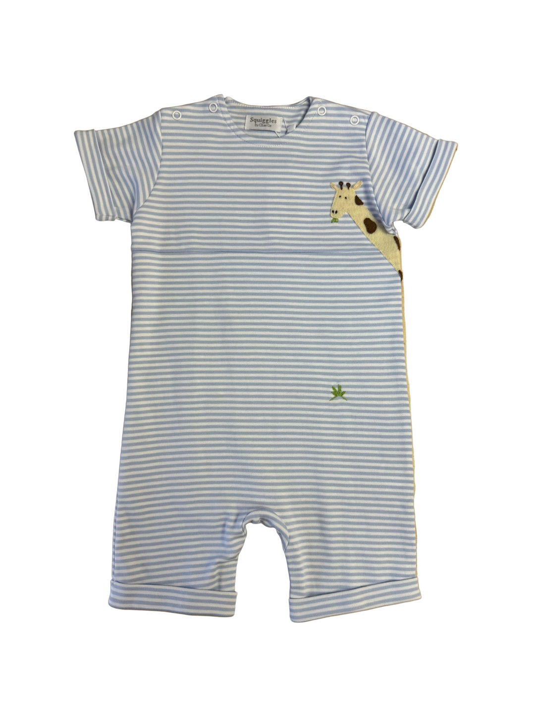Striped baby romper with a giraffe design on a wooden surface