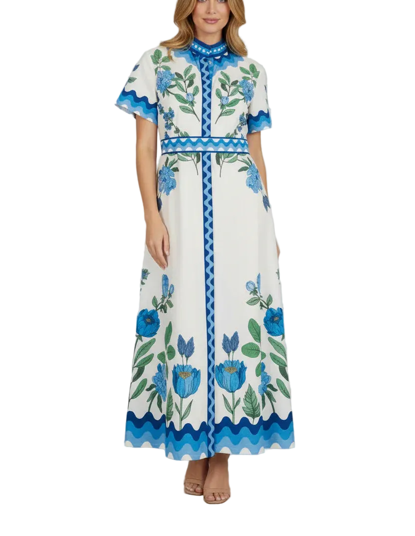 The Sydney is a sophisticated classic shirtdress. We love the stunning placement print, that elevates your wardrobe. It comes with an optional sash.

Covered placket, buttons down the front
Band Nehru collar that frames the face
Box pleat at the back for added comfort
