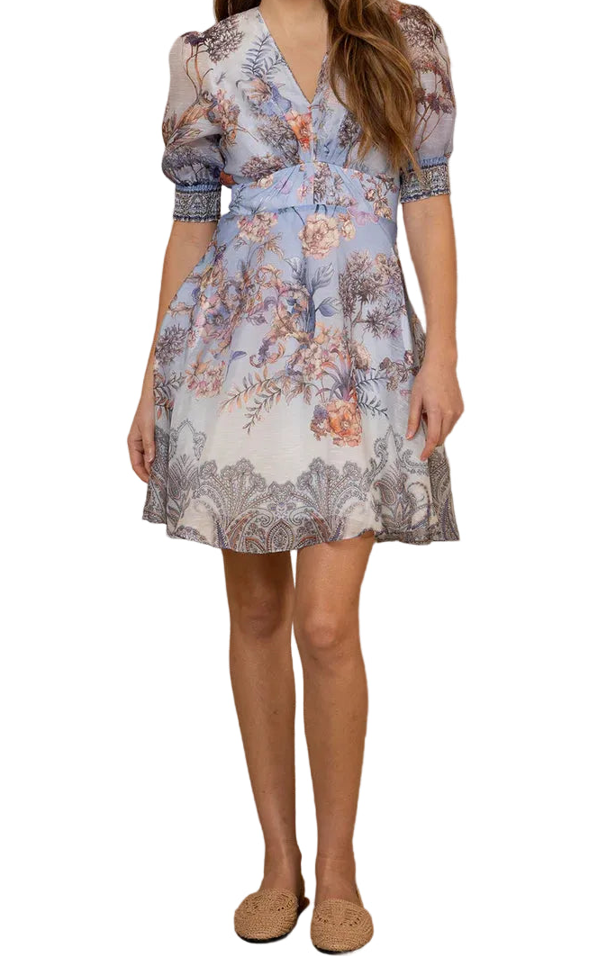 Woman wearing a floral dress on a white background