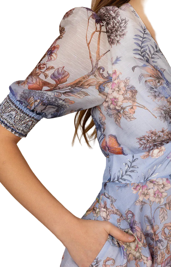 Floral patterned dress with a wooden background