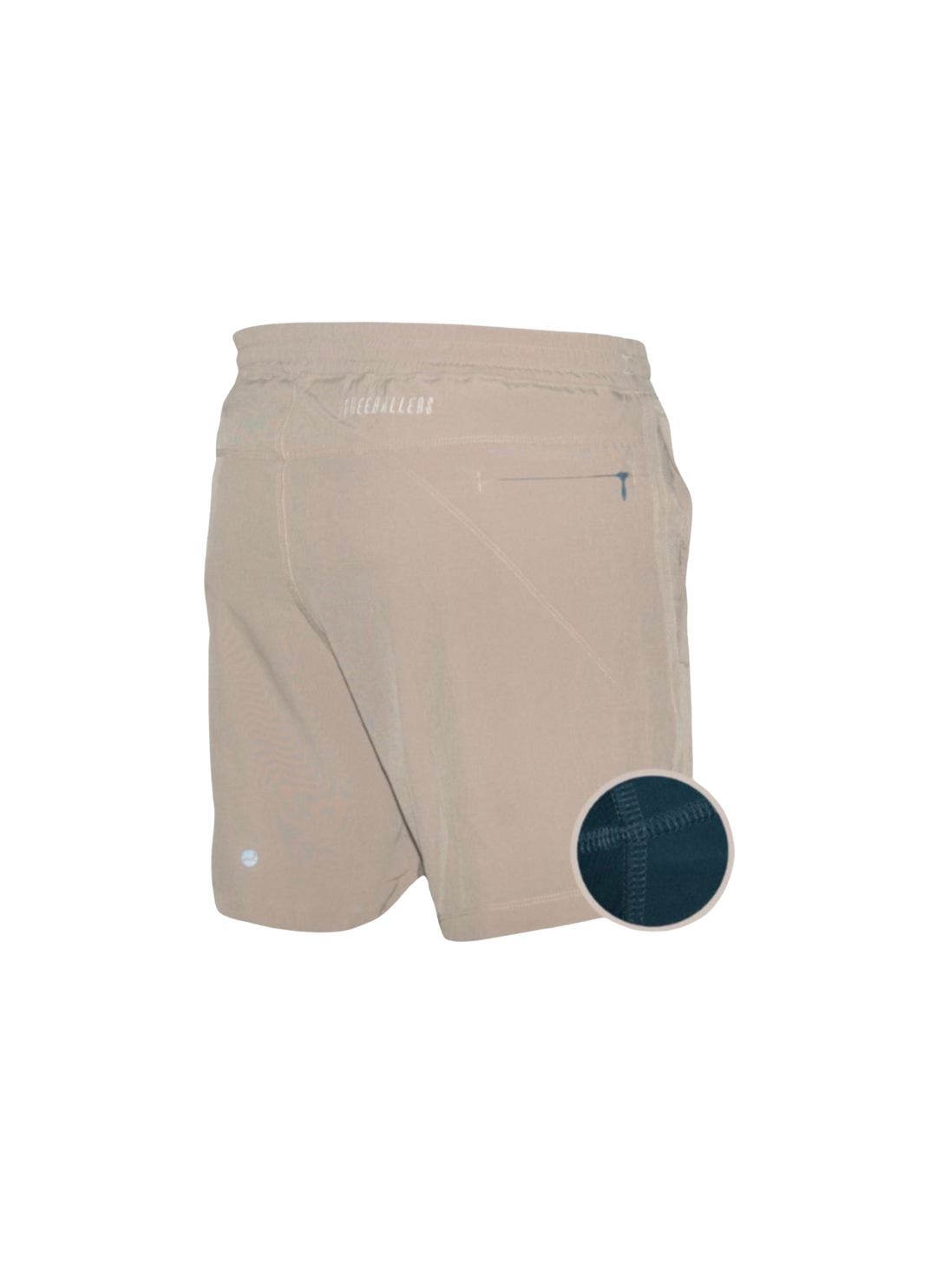Beige athletic shorts shown from the back, featuring a small circular inset in the lower right corner showing a close-up of a dark navy textured fabric detail.