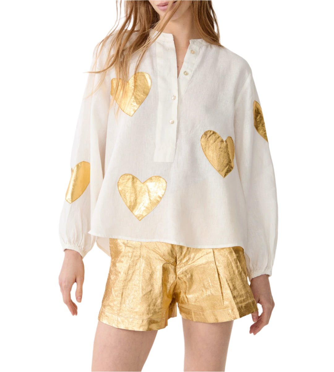 To fall in love with! The&nbsp;oversized Cupid Shirt&nbsp;is super comfy and elegant, featuring a mandarin collar, a hidden button placket, and puffed long sleeves.&nbsp;

Crafted with&nbsp;100% linen fabric,&nbsp;it has heart-shaped foil pink appliques that add a feminine and super fun vibe to this style.