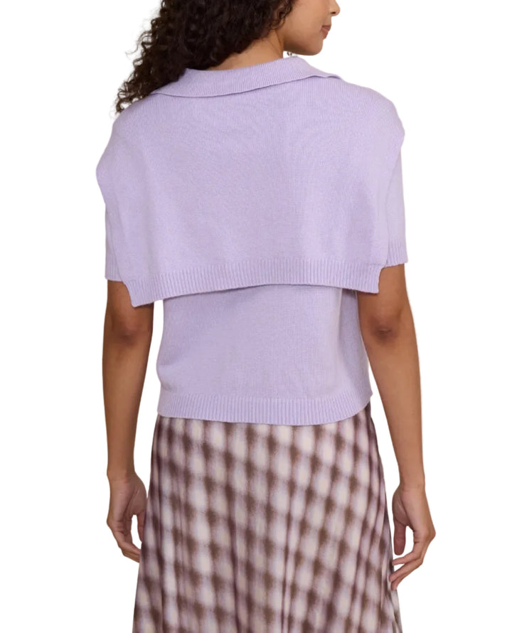 A coordinating knit tie detail drapes over the shoulders and knots at the front for a chic, layered effect
Finished with ribbed trims, this versatile knit brings a polished, feminine touch to everyday dressing