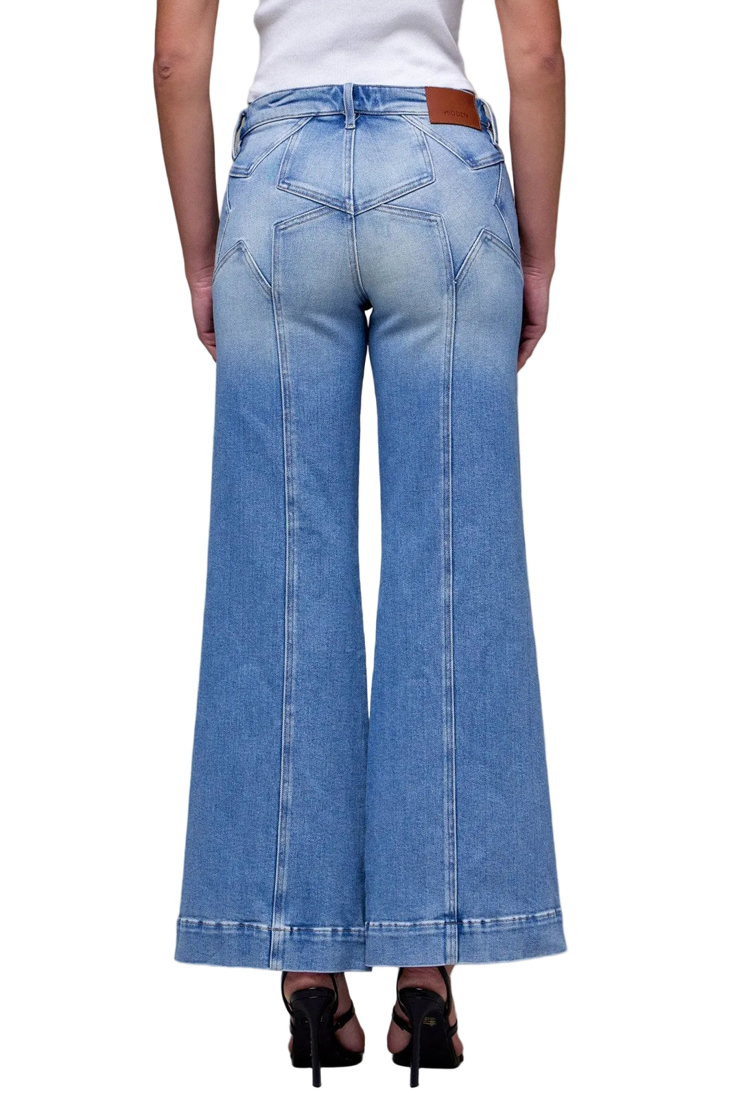 Elevate your denim collection with these light wash star fashion flare jeans. Featuring a flattering mid-rise cut and classic flare silhouette, they&