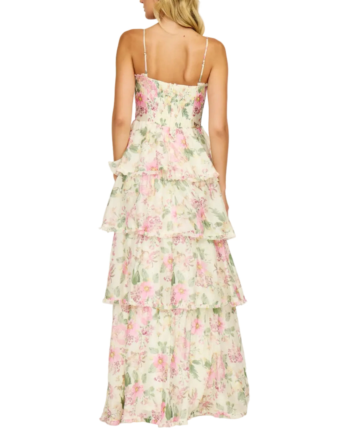 Woman wearing a floral dress on a white background