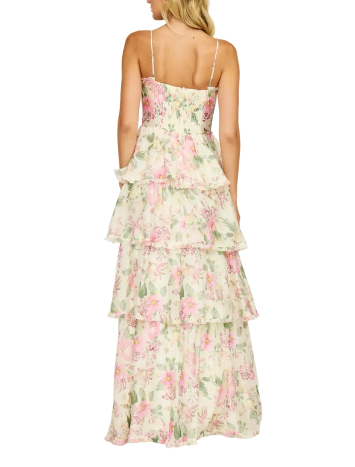 Woman wearing a floral dress on a white background