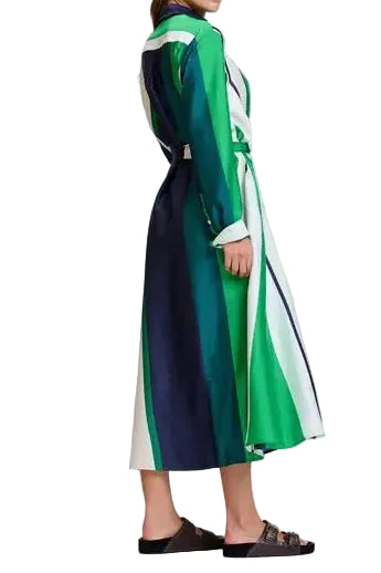 Woman wearing a colorful trench coat on a white background
