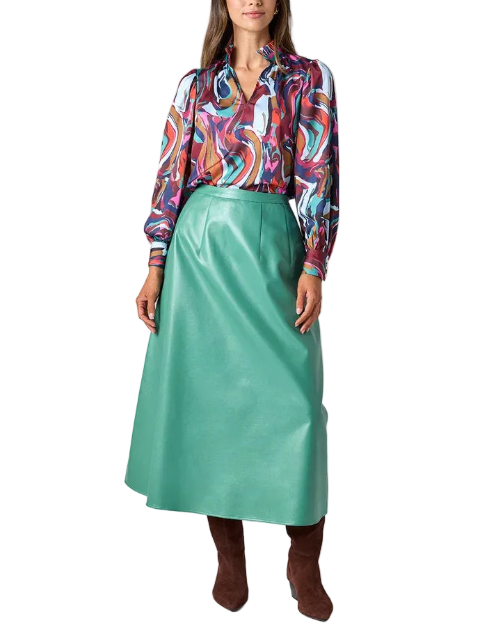 The Selene Skirt brings effortless movement to your fall wardrobe with its voluminous A-line silhouette, elasticized waistband, invisible side zipper, and pockets.