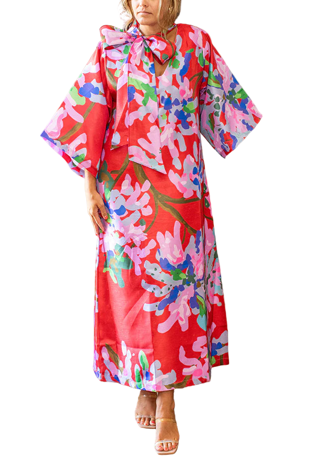 Classic, statement red with a bold, winding design of branches and florals dressed in violet and French blue with a dash of emerald. Miss Scarlet is a head turner wherever she goes. 

Introducing the dress of the season. 

Miss Scarlet© is an original design by founder and designer Michelle Bradley Robertson.  

Made of a poly blend shantung shell, lined in a soft pink satin and can be worn on the mock neck or v neck side. 