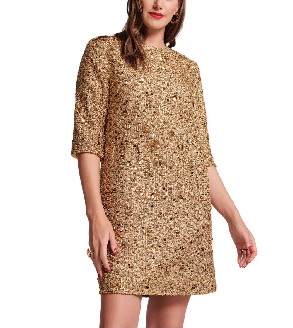 Shimmering metallic tweed meets timeless tailoring in the Mod Dress. Designed with a retro-inspired shift silhouette, this quarter-sleeve dress features a classic round neck, 3/4 sleeves, and unique circular pockets for that extra something-special. Speckled tweed is woven with glinting sequins and delicate embellishments along the trim, creating a refined, feminine statement perfect for holiday soirées or any special occasion.