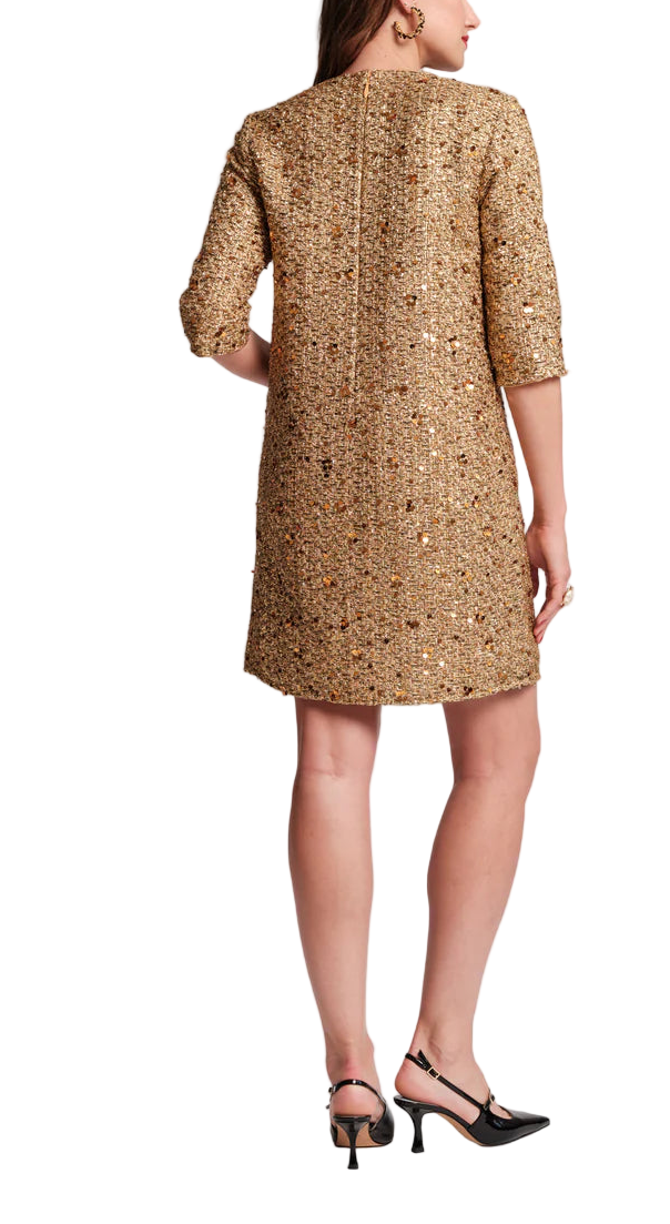 Shimmering metallic tweed meets timeless tailoring in the Mod Dress. Designed with a retro-inspired shift silhouette, this quarter-sleeve dress features a classic round neck, 3/4 sleeves, and unique circular pockets for that extra something-special. Speckled tweed is woven with glinting sequins and delicate embellishments along the trim, creating a refined, feminine statement perfect for holiday soirées or any special occasion.