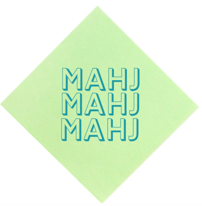 Green square napkin with 'MAHJ' text in blue
