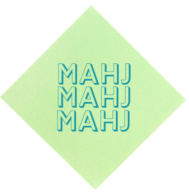 Green square napkin with &